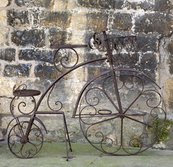 An old bicycle by the roadside.