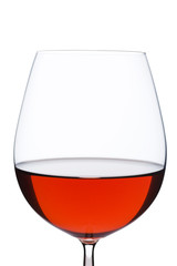 Isolated close up of red wine glass over a white background