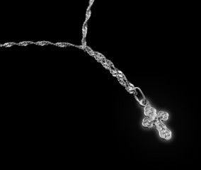 Fototapeta premium Silver chain with a dagger glow