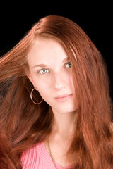 Naklejka premium beautiful redhead with blue eyes, head shot