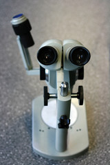 Fototapeta na wymiar An old microscope
