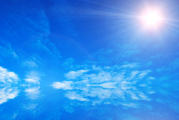 Fototapeta na wymiar Abstract blue sky with light sun