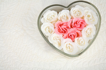 Heart Shaped Dish Filled with Ivory and Pink Roses in Corner