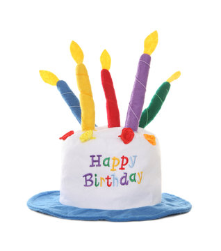 A colorful happy birthday hat over a white background