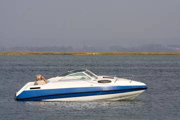 Acrylic prints Water Motor sports luxury recreation boat in the ocean