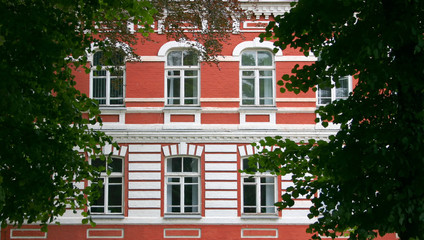 Windows in a wall of red color
