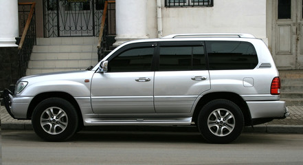 Toyota landcruiser silver color on the road