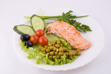 Stake from a trout with vegetables
