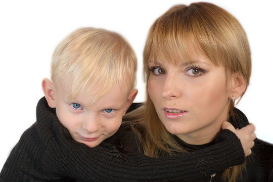 Mother and son looking at you with interest isolated