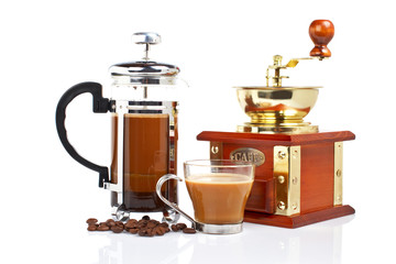 Grinder, coffee pot and beans, reflected on white background