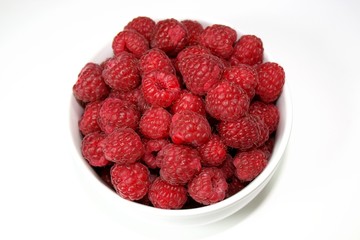 raspberries in a cup