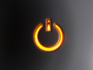 lit power button in orange color