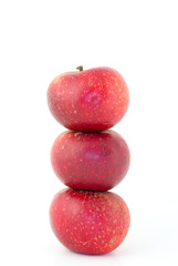 a pile of red apples isolated on white