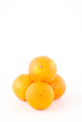 four oranges isolated on white
