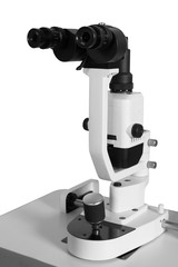 Modern and powerful microscope on a white background
