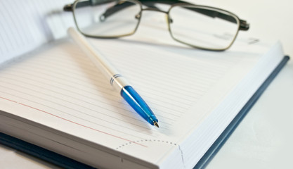 Fototapeta premium notebook, pen,glasses