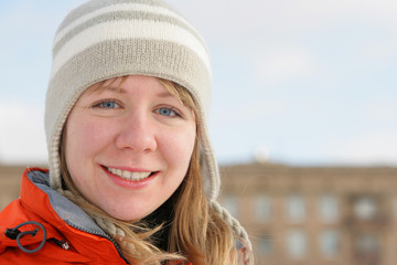 Portrait of young girl close-up in winter