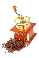 Vintage grinder and coffee beans, isolated on white background