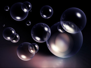 Bubbles floating on the dark background
