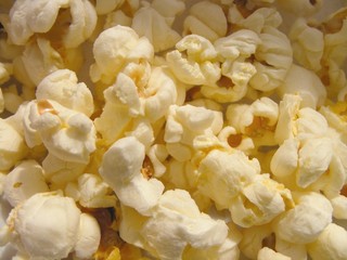 Salty pop corn on pile for movie session