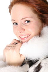 happy red hair girl in fur