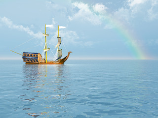 Fototapeta na wymiar Wonderful seascape with sailboat and rainbow