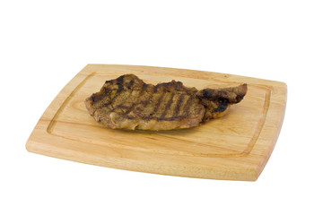 grilled steak on cutting board