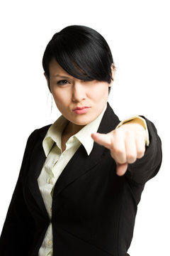 An isolated shot of a businesswoman pointing her index finger