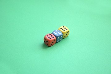 dice on a green background