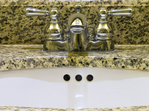 Sink with taps for hot and cold water