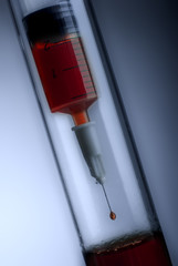 abstract image of injection in a glass tube close up