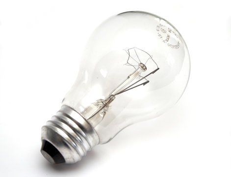 Transparent light bulb at white background