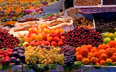 Fototapeta na wymiar A street market with a huge range of fruits and nuts for sale.