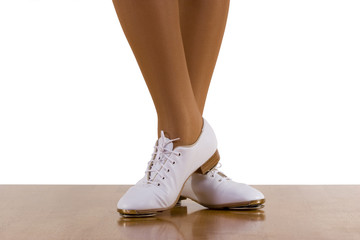 Tap-top/Clog dancer in clogging shoes; on white
