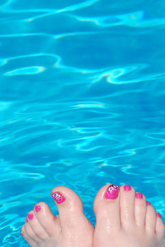 Woman's Feet in Pool
