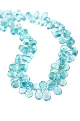 Beads from quartz on a white background