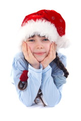 Happy girl in christmas hat