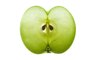 Thin sectional slice of apple showing seeds and structure