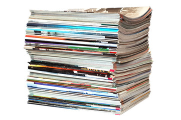 Pile of magazines on white