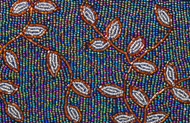 Background. A glass mosaic from color beads