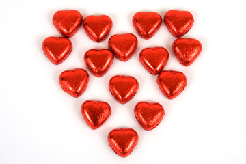 Candy valentine hearts against a white background