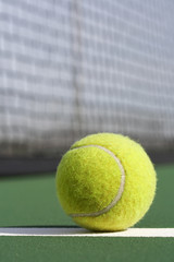 a picture of a tennis ball on the court