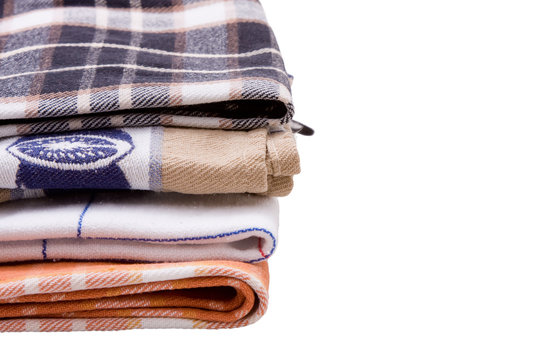 A Stack Of Tea Towels On A White Background