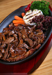 Prepared mushroom with meat and vegetable detail