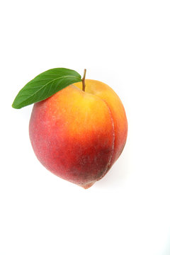 peach on isolated background, with natural leave