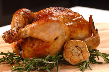 Fresh roasted chicken with garlic and rosemary