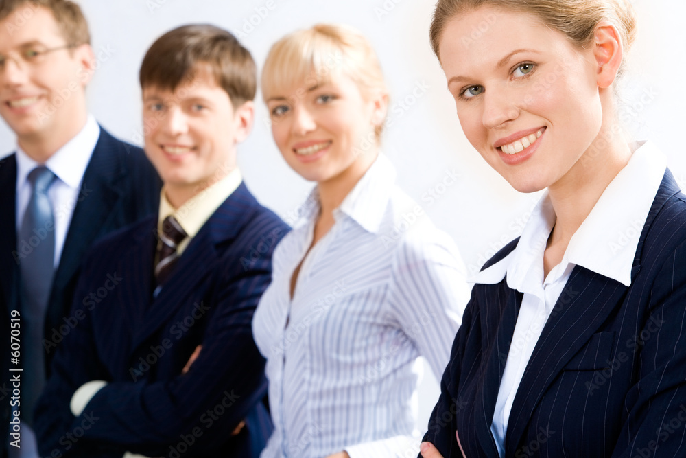 Wall mural portrait of business leader with her working team