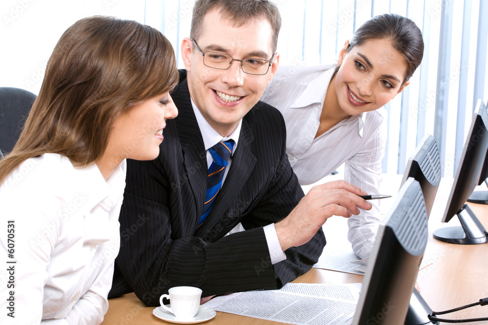 Canvas Prints Three business people discussing working questions