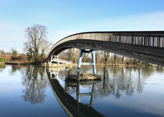 A contemporary Wooden Footbridge over the River Thames
