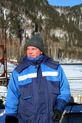 The man on a background of a wood